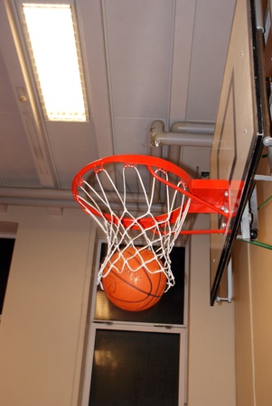 Ball goes through the basket の写真素材