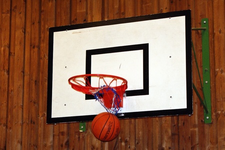 Ball goes through the basket の写真素材