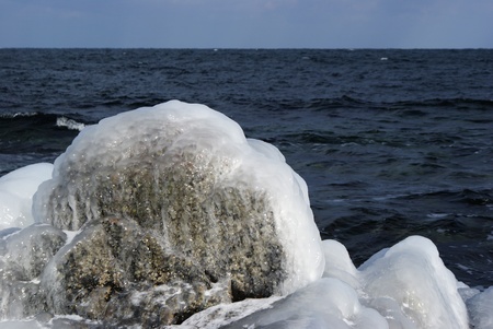 Icicles on rocksの写真素材