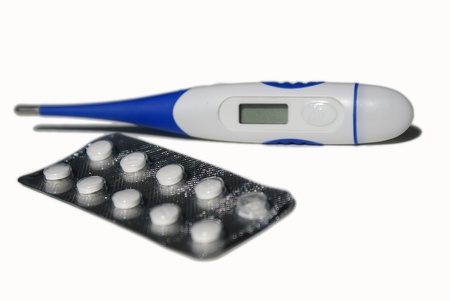 Got the flu  Painkillers and thermometerの写真素材
