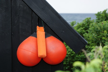 Fenders hanging on fishermans hut