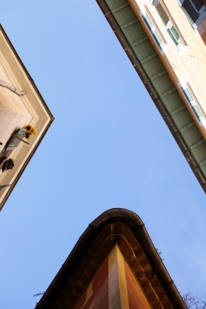 Looking up where small steets meet in Nice. France.の写真素材