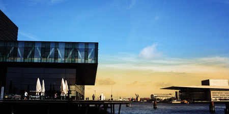 Copenhagen central waterfront: Royal Danish Playhouse and Copenhagen Opera House. Architects: Lundgaard & Tranberg, Royal Danish Playhouse. Henning Larsen, the opera houseのeditorial素材