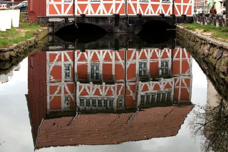 Reflection of the old town symbol of Wismar.の写真素材
