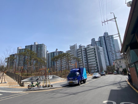 Parked electric scooters on the street in the city of Seoul, South Korea