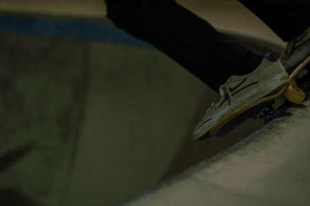 Skateboarder in skatepark, closeup. Space for text
