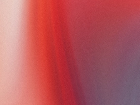 Gradient blend of red hues transitioning into neutral tones on a textured surface