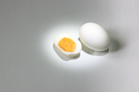 eggs on a gray background in the light and in the contextの写真素材