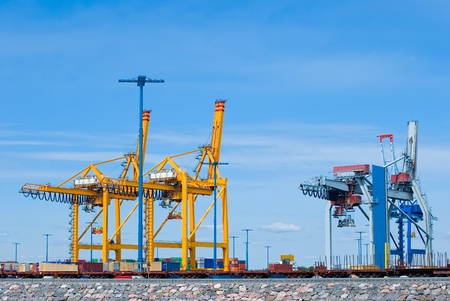 Containers loading at sea trading portのeditorial素材