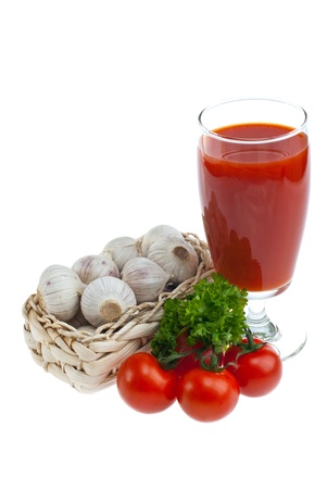 Tomato juice, garlic, parsley, shot on a white background.の写真素材