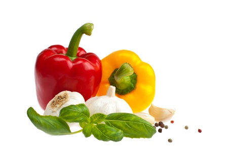 Peppers, garlic, basil shot on a white background.の写真素材