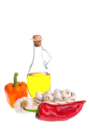 olive oil, pepper, garlic shot on a white backgroundの写真素材