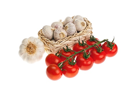 garlic, tomatoes, shot on a white backgroundの写真素材