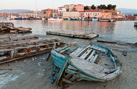 Old boat in the rays of the setting sun  Chania  Crete の写真素材