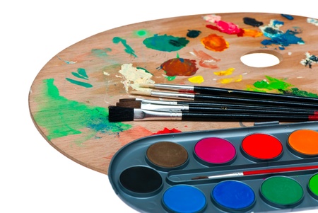 Paints and brushes shot in studio on a white background の写真素材