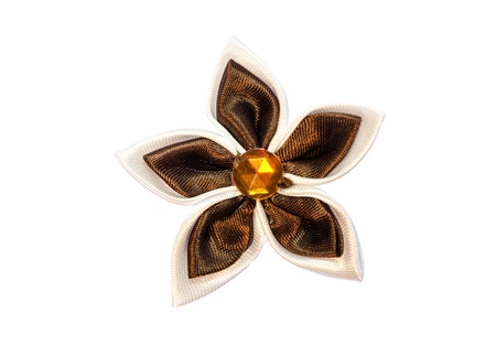 Fabric flower brown isolated on white background の写真素材