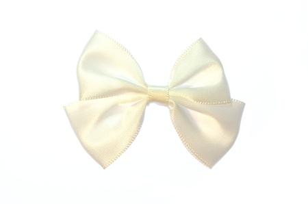 White bow isolated on white background の写真素材