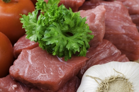 fresh raw meat on wooden boardの写真素材