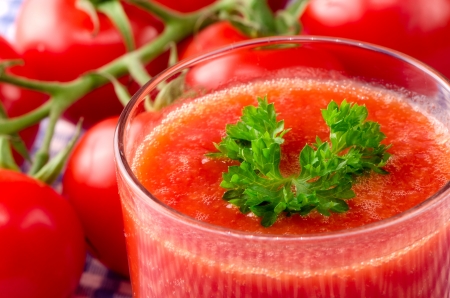 Fresh tomato juice with herbsの写真素材