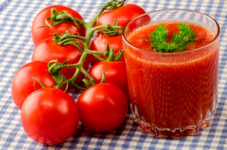 Fresh tomato juice with herbsの写真素材