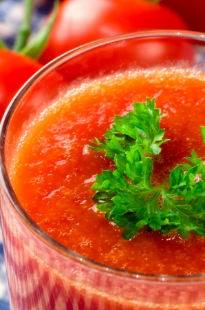 Fresh tomato juice with herbsの写真素材