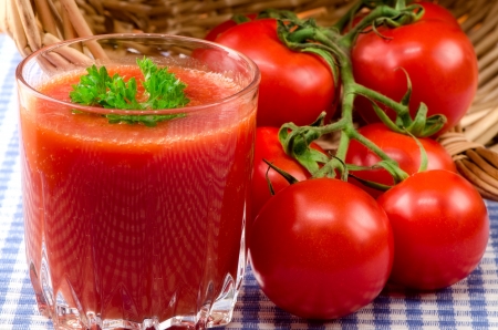 Fresh tomato juice with herbsの写真素材