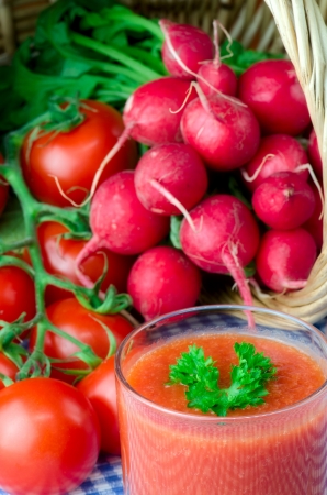 Fresh tomato juice with herbsの写真素材