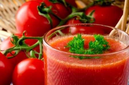 Fresh tomato juice with herbsの写真素材