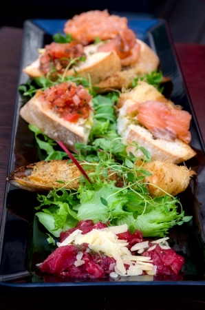 Sandwich with vegetables and fishの写真素材