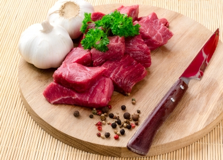 raw meat, vegetables and spicesの写真素材