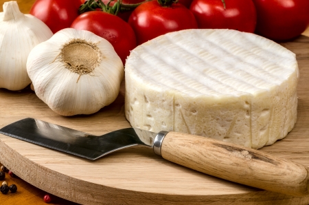 French soft cheese on wooden board.の写真素材
