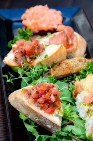 Sandwich with vegetables and fishの写真素材