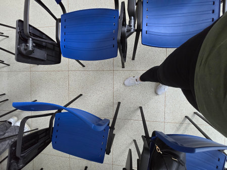 Empty chairs in a waiting room at the airport, closeup of photoの写真素材