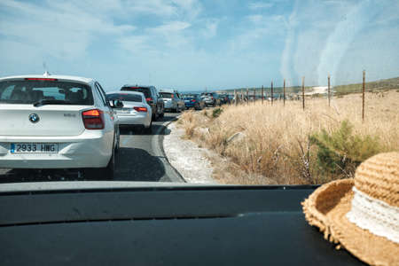 TARIFA, SPAIN; AUGUST 28, 2020: Trip to Playa de Bolonia, CÃ¡diz, Spain. Arriving at the beach and parking the carのeditorial素材