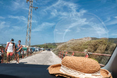 TARIFA, SPAIN; AUGUST 28, 2020: Trip to Playa de Bolonia, CÃ¡diz, Spain. Arriving at the beach and parking the carのeditorial素材