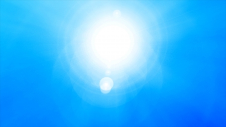 Beautiful sun over blue sky の写真素材