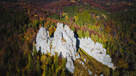 Forest Mountines with rocks landscape. Autumn colours. Aerial view from a drone. Ukraine.の写真素材