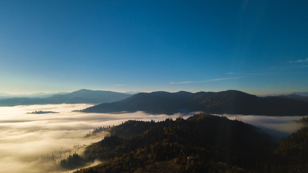 Majestic sunrise in the mountains landscape. Carpathian mountins with blue sky panoramic wiew, Ukraine.の写真素材