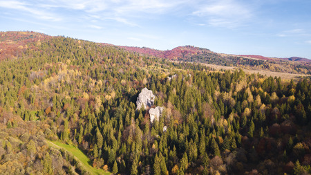 Forest Mountines with rocks landscape. Autumn colours. Aerial view from a drone. Ukraine.の写真素材