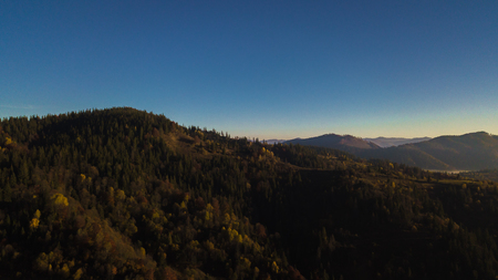 Majestic sunrise in the mountains landscape. Carpathian mountins with blue sky panoramic wiew, Ukraine.の写真素材