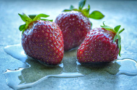 three stawberry on waterのeditorial素材