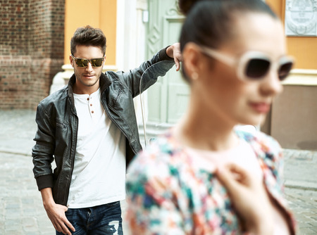 Attractive young couple in the downtownの写真素材