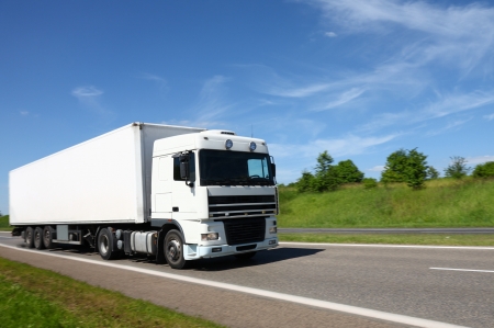 White truck is going on road White truck is going on road
