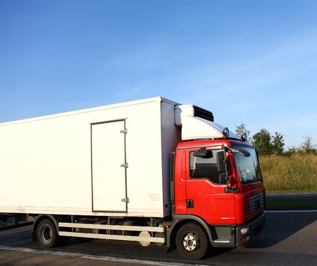Red truck on the roadの写真素材