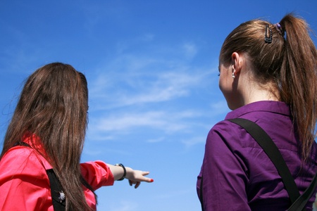 Two young businessladies looking aheadの写真素材