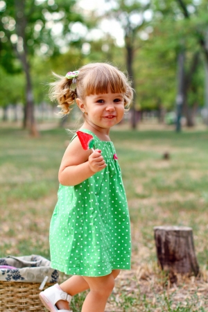 Caucasian little girl in the parkの写真素材