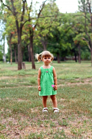 Caucasian little boy and girl in the parkの写真素材