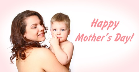 Young mother with a charming baby on white backgroundの写真素材