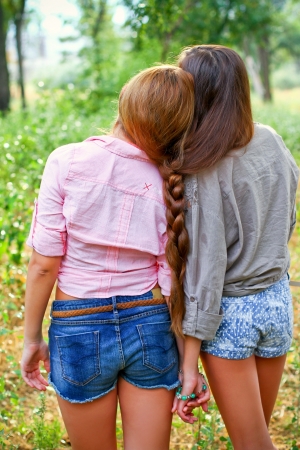 Two girlfriends with  pigtail outdoorsの写真素材