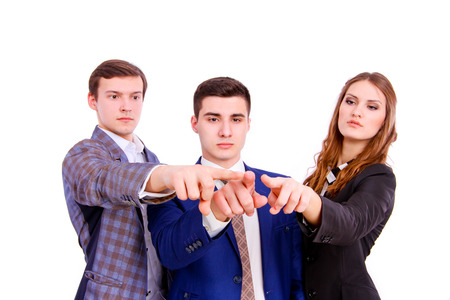 Group of business people  touching virtual screen over white backgroundの写真素材